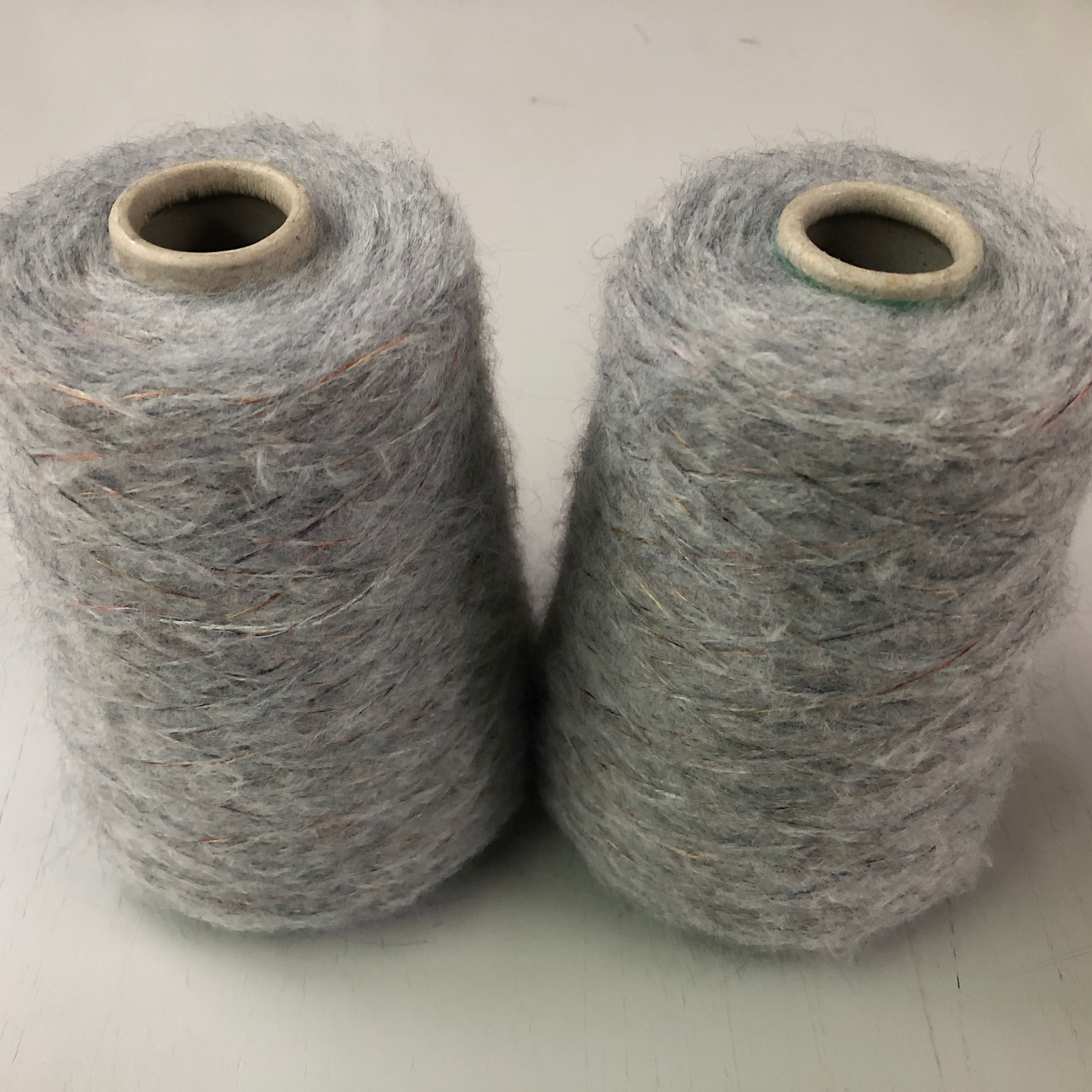 57% Polyacryl 19% Polyamid 12% Viskose 12% Wolle Nm 3,6 "Bongo"