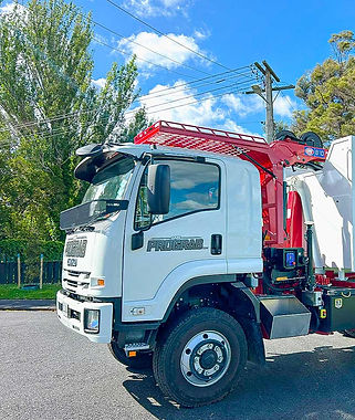 Attachment view: Prograb's crane truck with specialized equipment for diverse waste management tasks