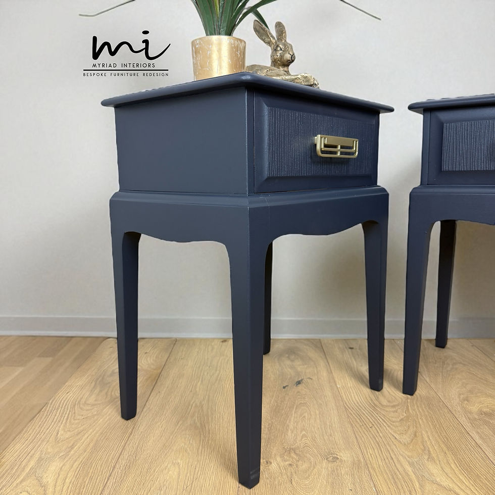Thumbnail: refinished vintage Stag Minstrel bedside tables in navy blue with gold handles. 