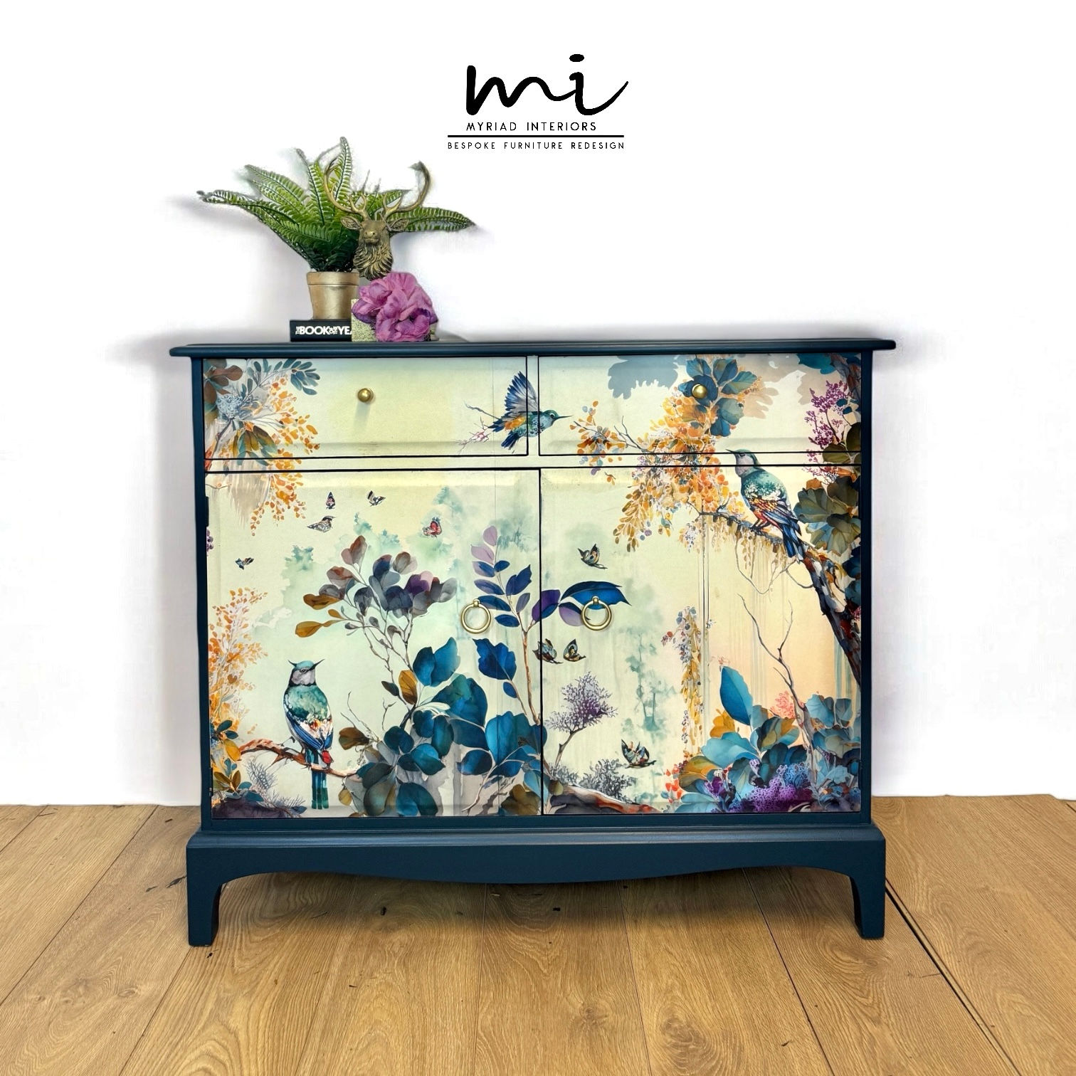 Pretty Stag Minstrel Sideboard in deep teal with floral bird design navy blue 