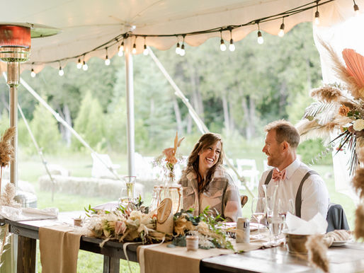 Alexare and Mitch’s rustic backyard wedding near Ottawa, featuring a white tent reception, greenery decor, and relaxed countryside vibes.