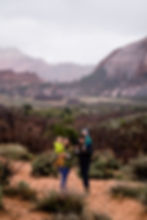 Family hiking Lambs Knoll outside Hurricane Utah