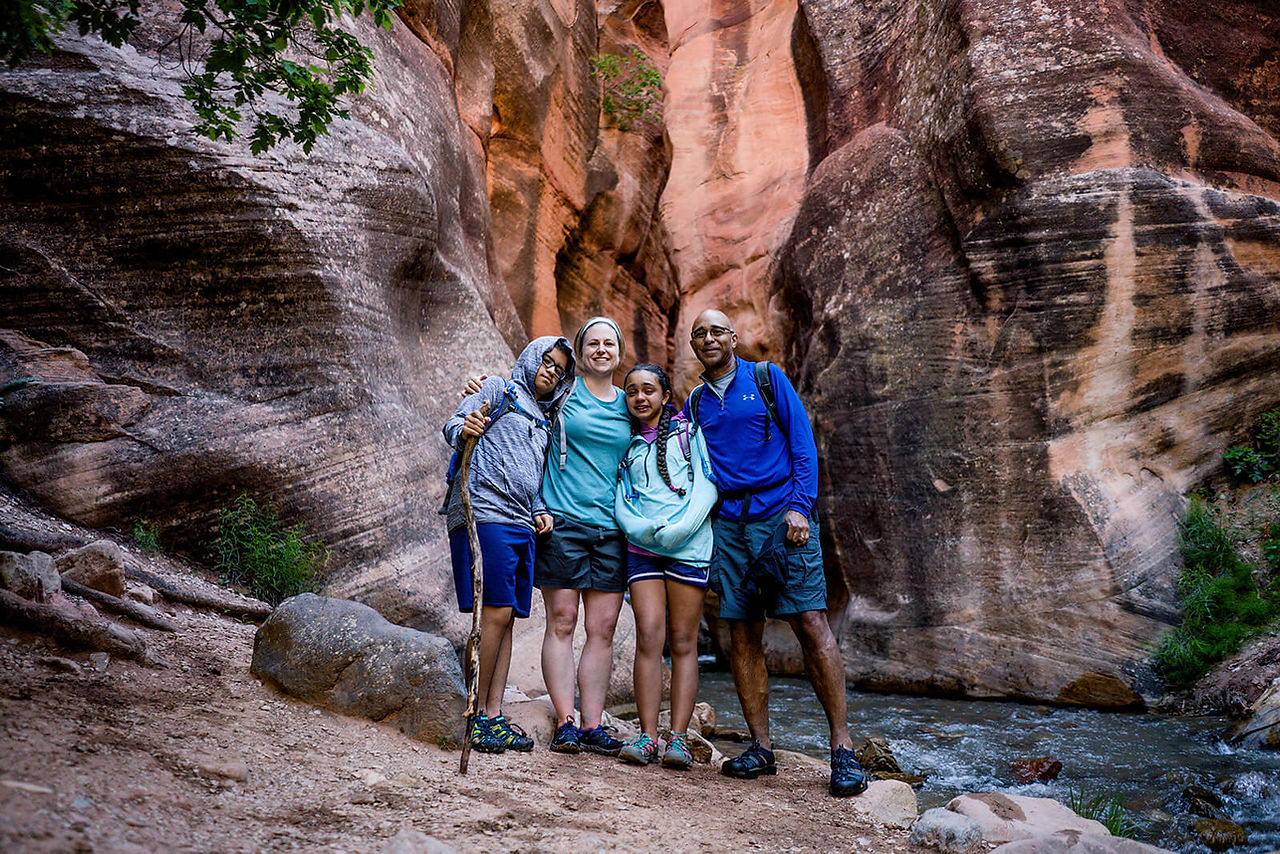 Family hiking Kanarra Falls in Southern Utah