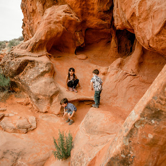 Family hiking Red Reef trail in Hurricane Valley, Southern Utah