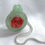 Thumbnail: Red Rose on Soft Green backing