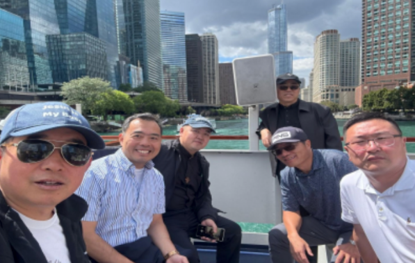 Priests enjoying fraternity on the Chicago River cruise.