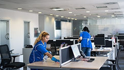 Cleaners clean empty office space photo.