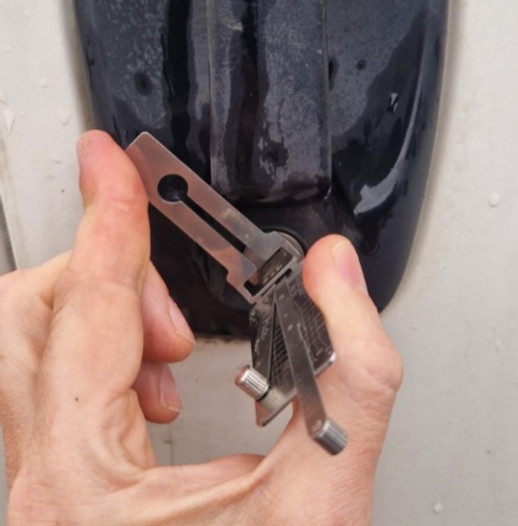 Car locksmith providing damage-free van door entry service in Glasgow - professional car and van lockout tool