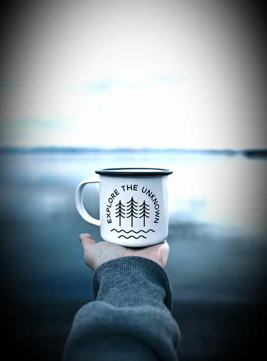 person holding white mug_edited.jpg