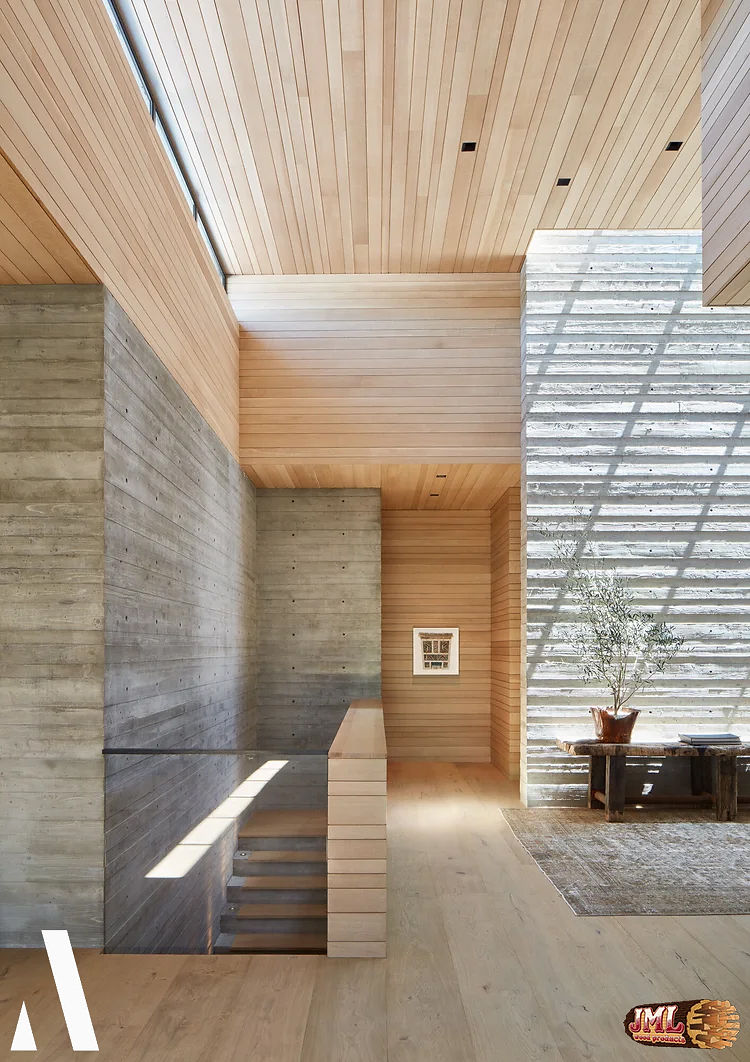 Second level walkway from the stairs, highlighting the natural and faux wood walls.