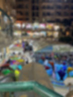 Busy mall under apartment buildings (imagine trying to sleep at night!)