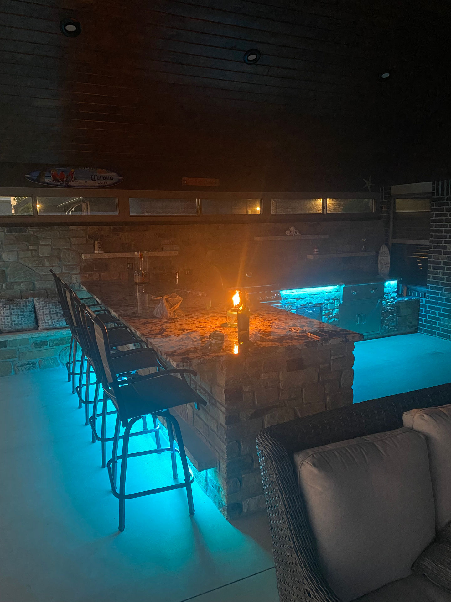 Color changing LED accent lighting on an outdoor kitchen area