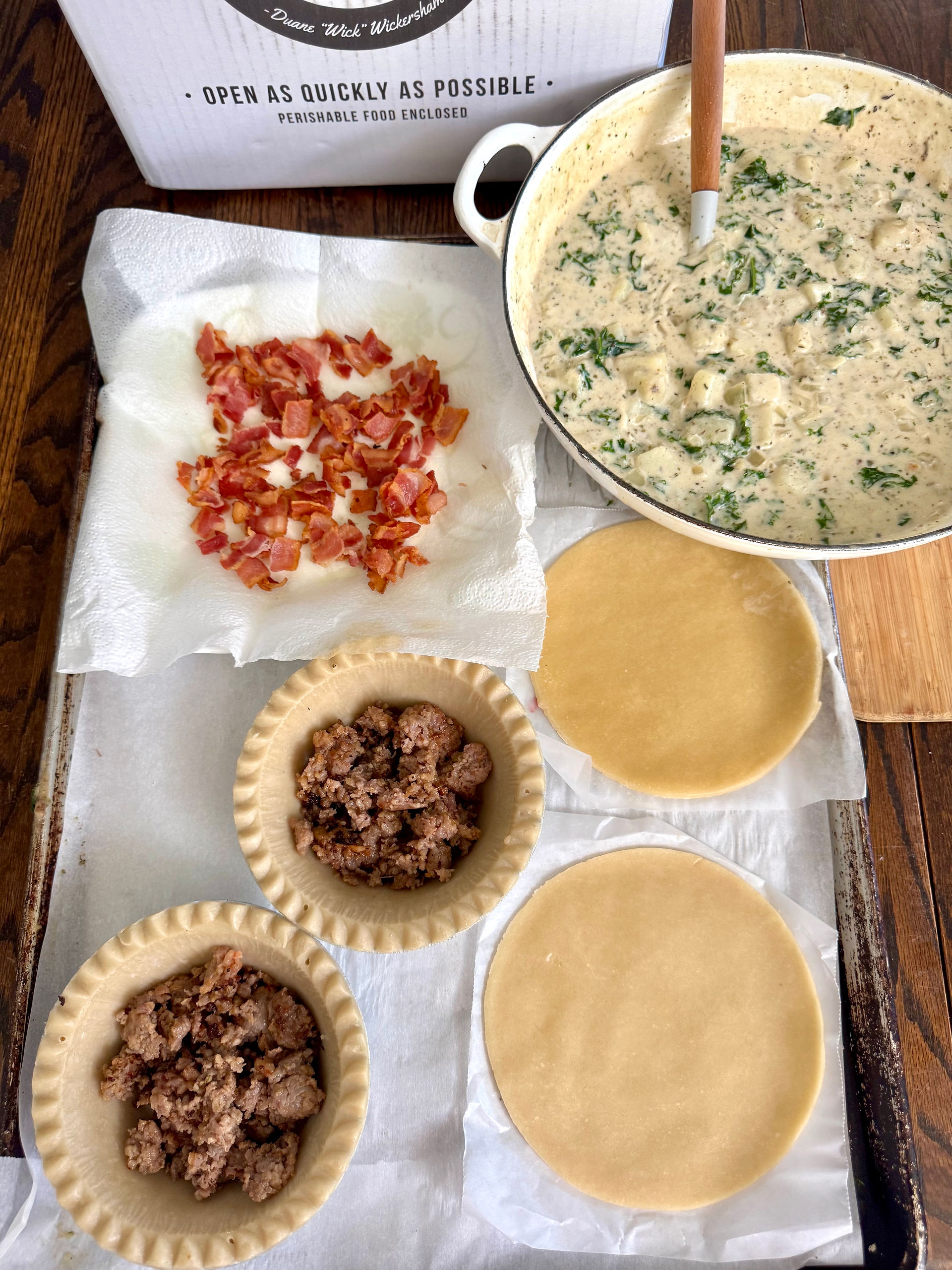 Fill Wick's Pie Shell with cooked sausage and bacon then pour on the gravy. 
