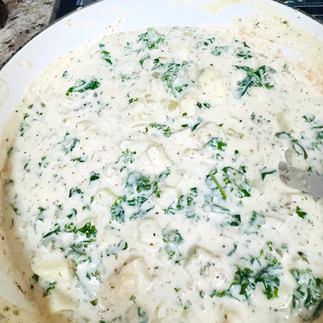 Add the microwaved potatoes after the cream sauce has been made.