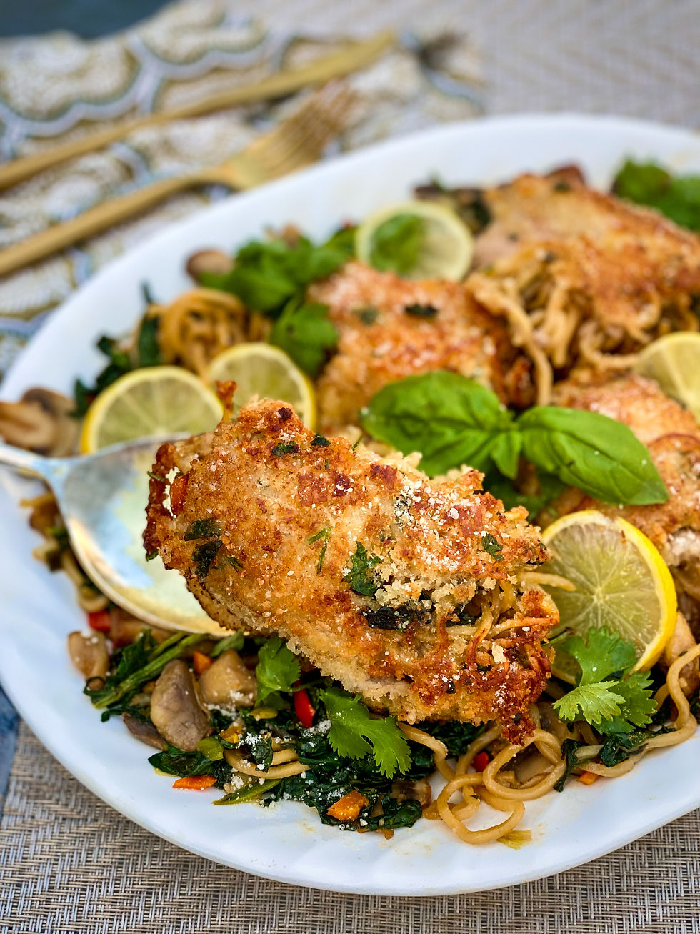 A noodle stuffed chicken roll that has been breaded and fried.