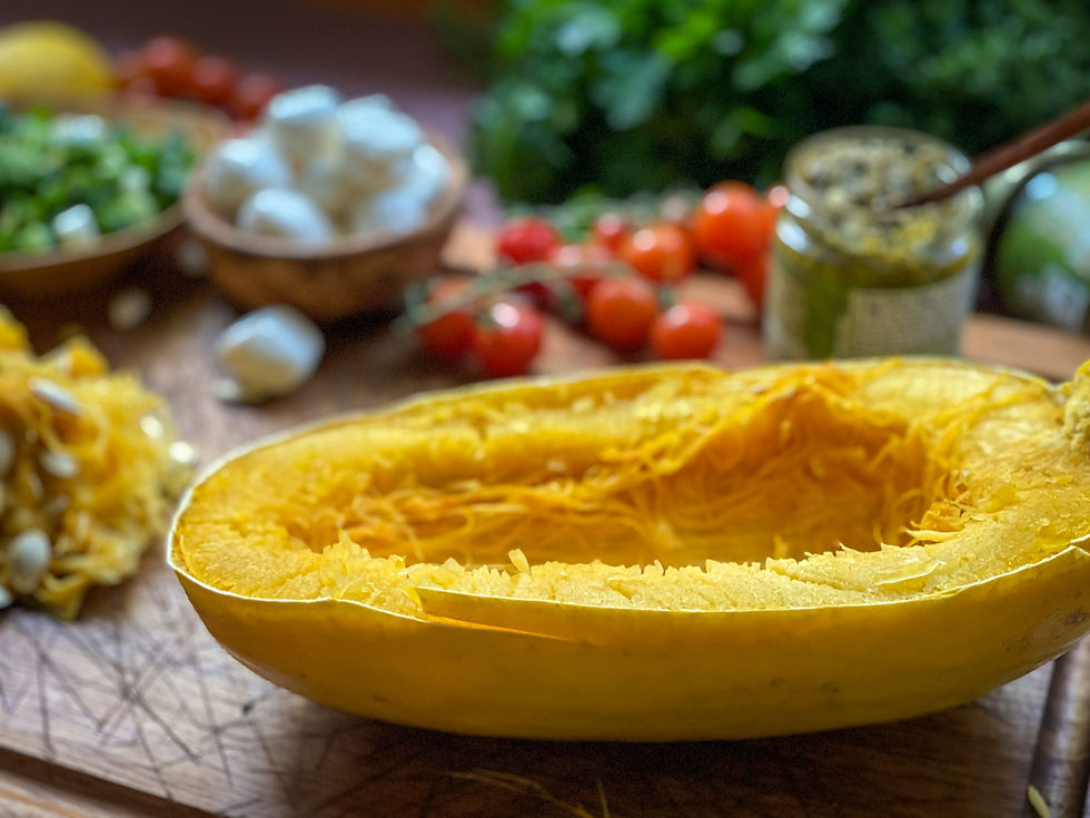 Half of a spaghetti squash that has been parcooked.