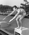 Early - Mike on starting block - plaque picture.jpg