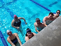Shawn - in water with team.jpeg