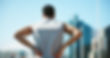 Back, tired and man outdoor for fitness with fatigue, exhausted and relax for exercise rec
