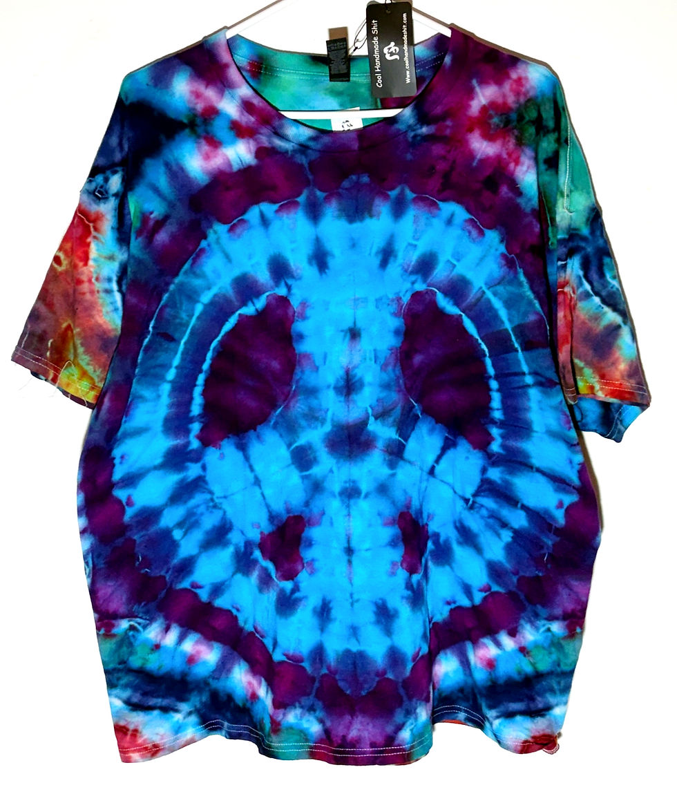 Handmade tie-dye shirt with centered peace symbol in blue, purple, red, and green.