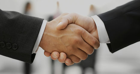 Image of clients making a deal