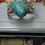 Thumbnail: Kingman Turquoise & Sterling Silver Repousse Floral Design Cuff