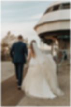 Bride and Groom Walking to Gondolas