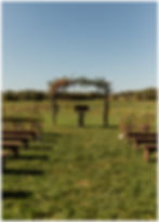 Rustic Wildflower Wedding Ceremony at Johnsons Locust Hall Farm - Photo by Sara Fitz Co