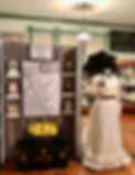 2022 Deandale exhibit with manneqin with white dress and black parasol