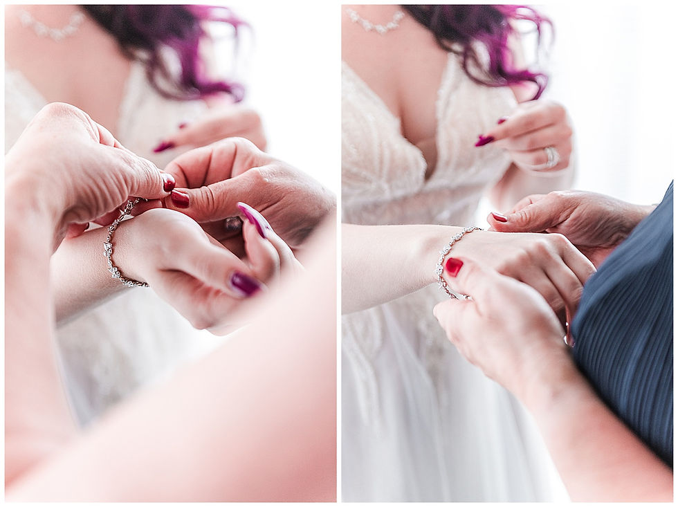 Mother of the bride putting on bride's jewelry