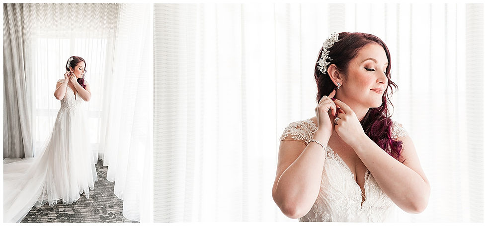 Bride putting on earrings on wedding day