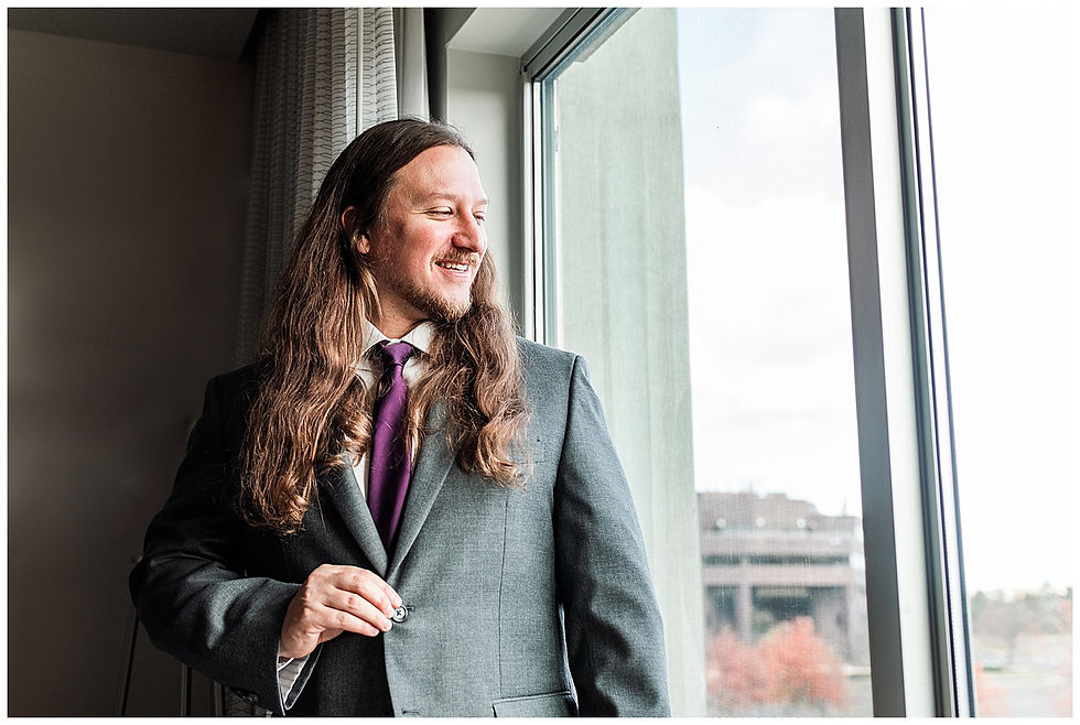 Groom getting ready with father of the groom Long hair Groom Andalusia PA wedding hotel