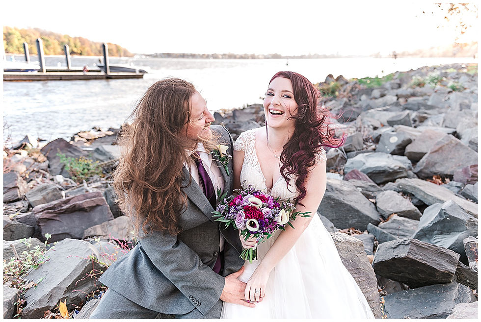 Portraits water rock jetty trees fall first look at bristol Warf Andalusia PA wedding park long hair groom purple hair heavy metal