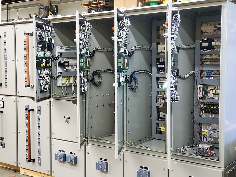 Eye-level view of a motor control panel with switches and wiring