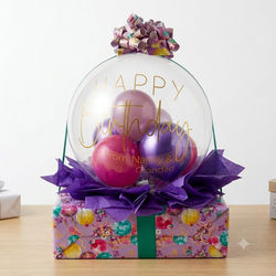 birthday gift with bobo balloon and purple bow