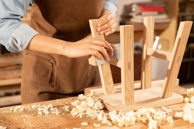 lovepik-carpenter-beauty-worker-custom-wooden-furniture-picture_501667529-transformed.jpeg