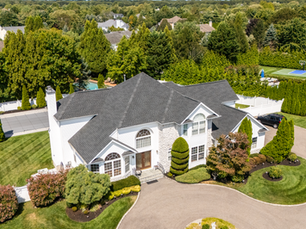 This Miller Place home is now protected by a GAF Timberline HDZ 50 year roof in Charcoal.