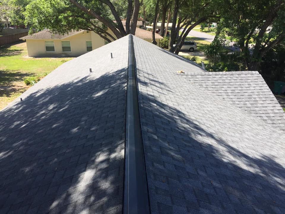 Gable style gray shingle roof installation in Brevard County, Florida.