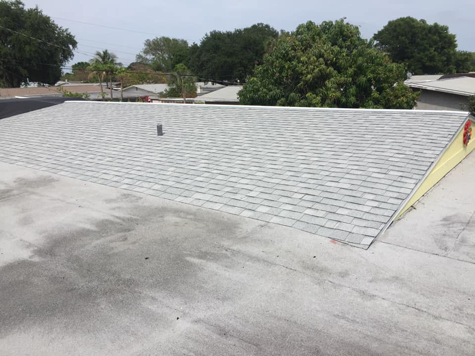 Shed style gray shingle roof installation in Merritt Island, Florida.