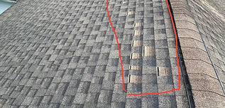 Shingles missing from a roof in Palm Bay