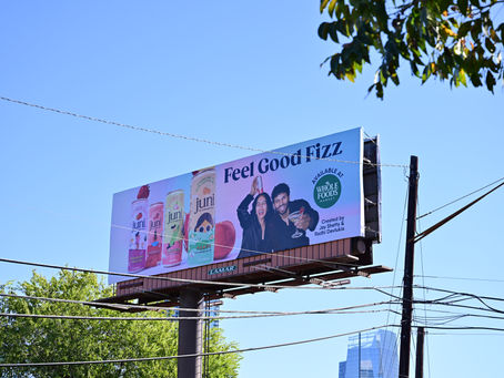 Juni functional beverage billboard advertising campaign in Austin, Texas supporting Whole Foods retail expansion