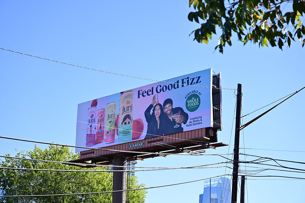 Juni functional beverage billboard advertising campaign in Austin, Texas supporting Whole Foods retail expansion