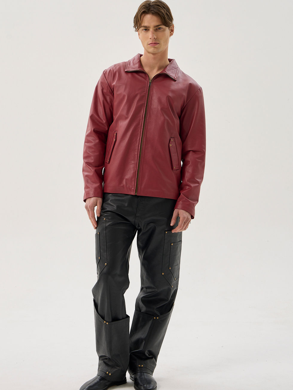 Red calfskin jacket with zip front, angled pockets and boxy fit