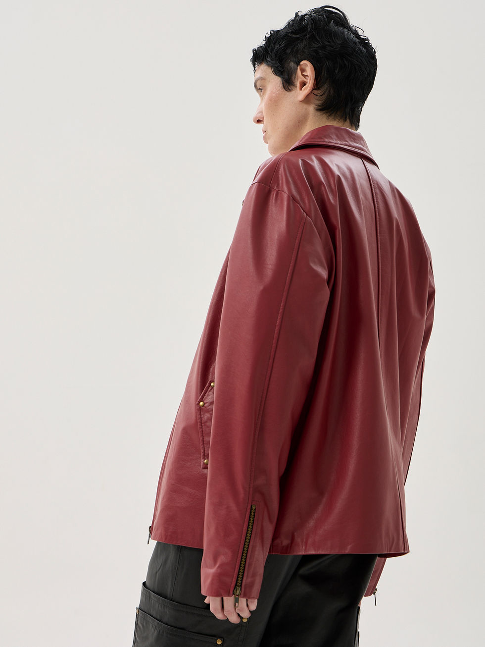 Red calfskin jacket with zip front, angled pockets and boxy fit