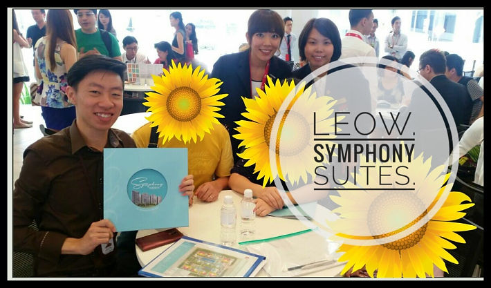 Louis Tey with clients after successful property transaction