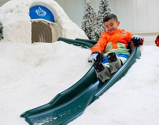 child on slide