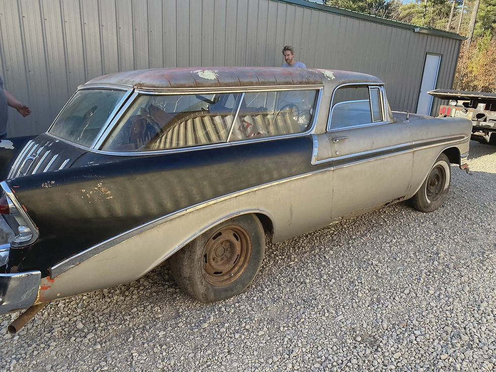 side view of chevy nomad outside before restoration