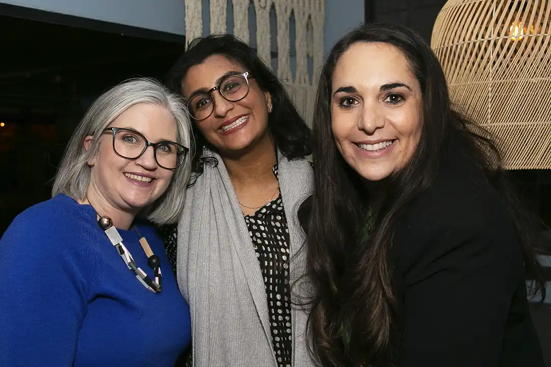 Women networking at a Hertfordshire business event.