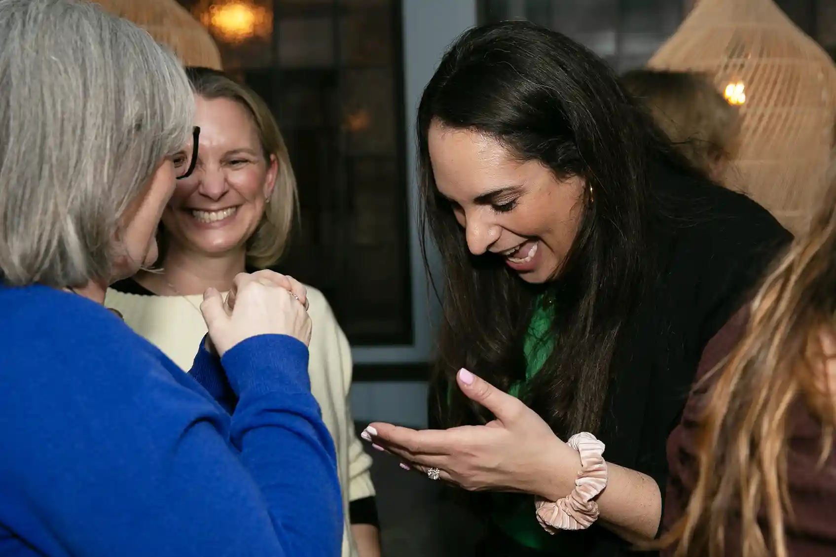 Businesswomen connecting at a Level Up Ladies networking event.