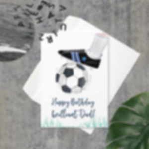 Happy Birthday brilliant Dad card, featuring a soccer theme with a boot and ball, grass details at the bottom.